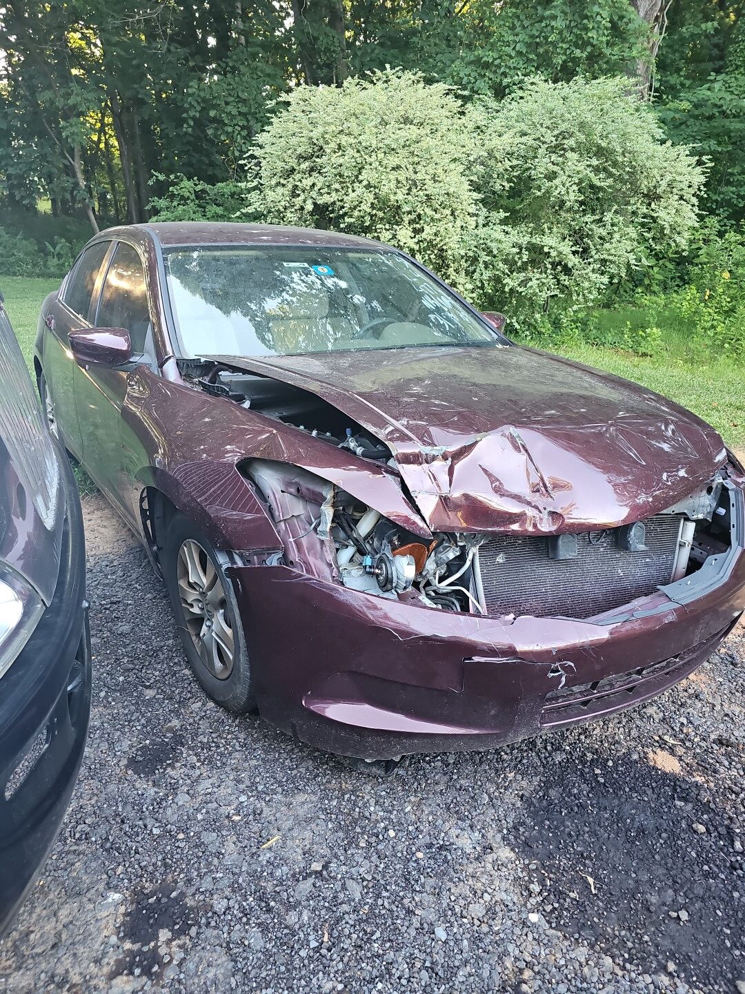 badly damaged junk car